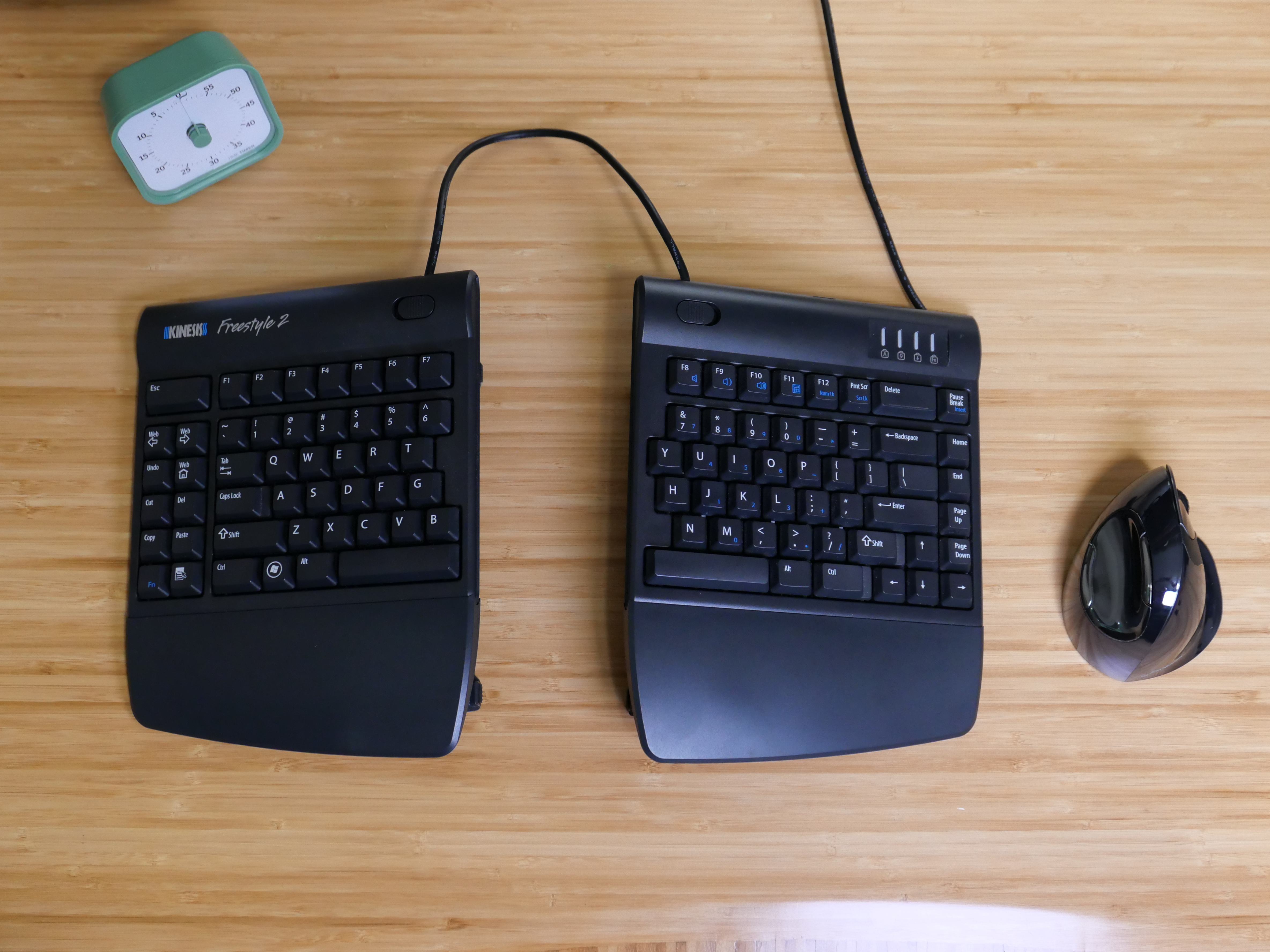 Photo showing Kinesis Freestyle 2 split keyboard with the optional VIP3 tenting accessory
